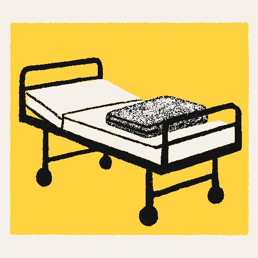 Printed symbol for Rural Hospital Relief Act: Rural hospital examination bed